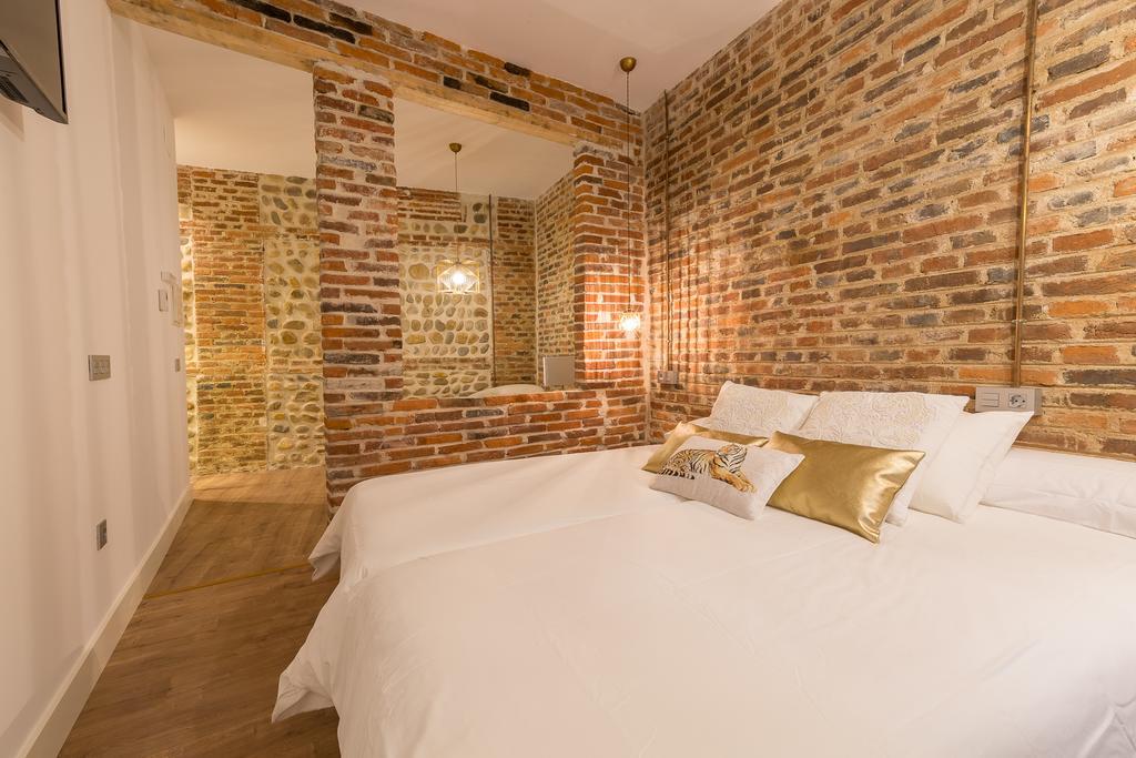 Albany Ancha Hotel Leon Exterior photo A bedroom at the hotel